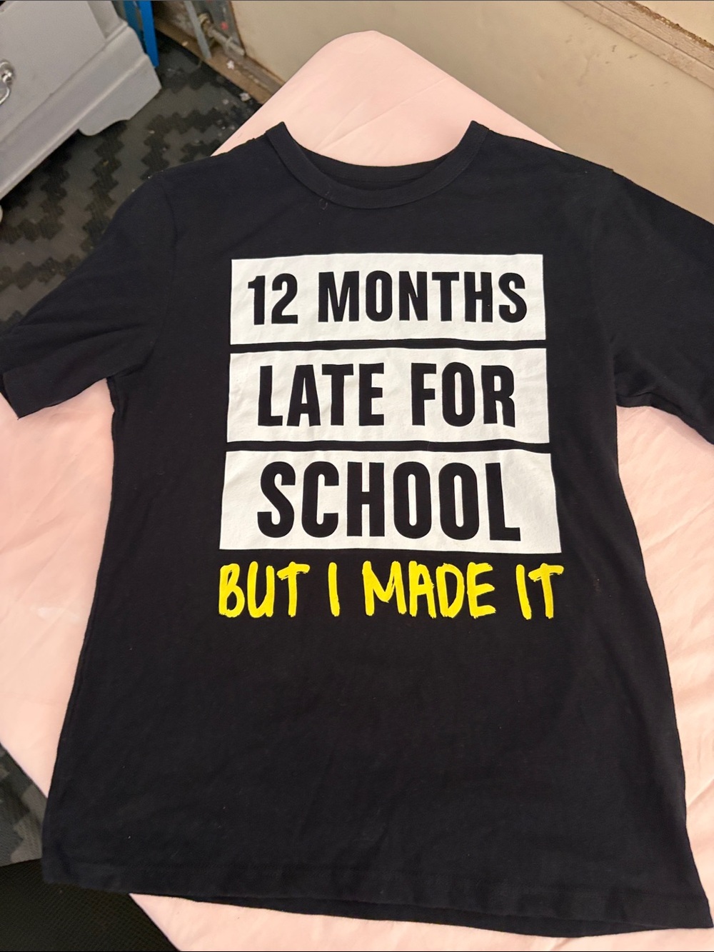 Place Black Graphic Tee with White & Yellow Text